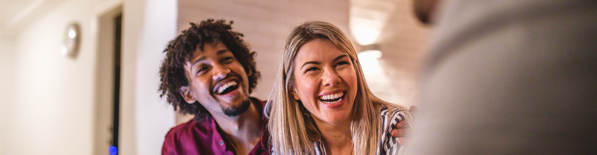 Smiling Couple A man and woman laughing.