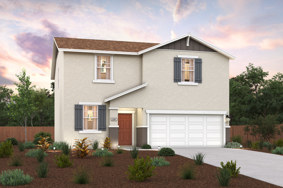 A house with a garage and a driveway.