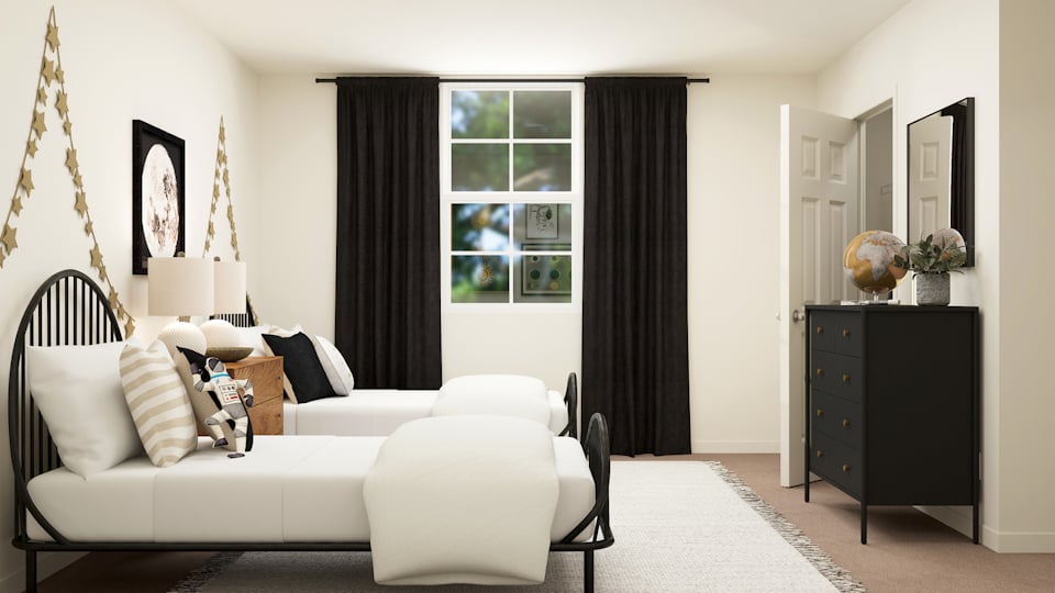 A room with a couch and a table.