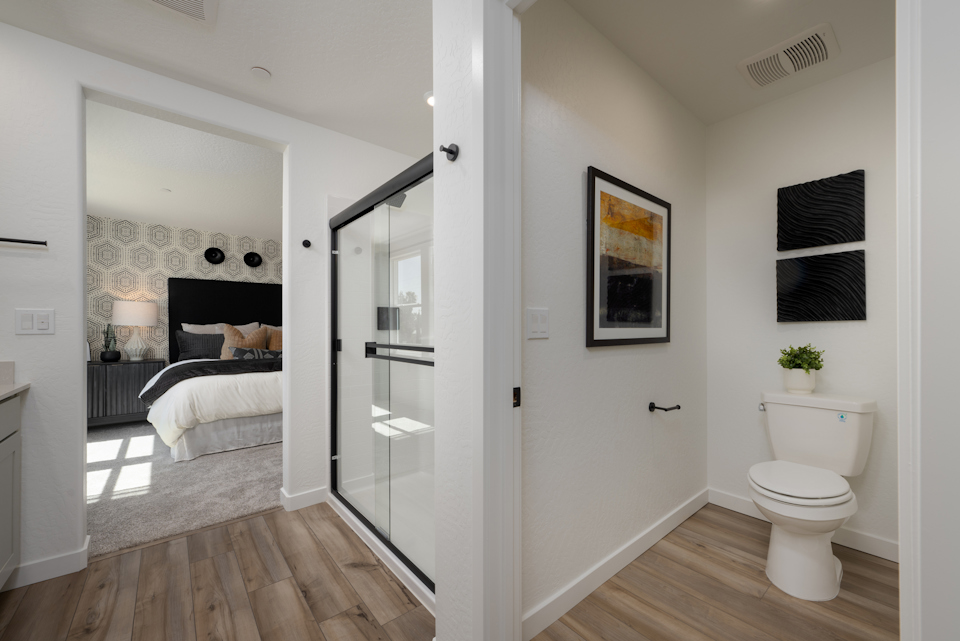 A bathroom with a glass shower.
