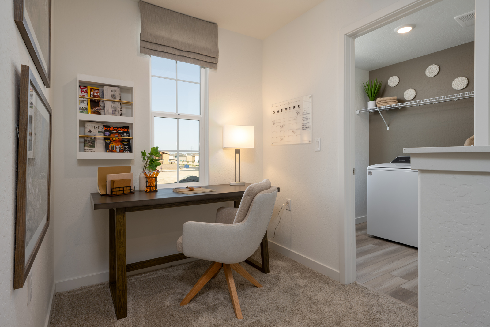 A room with a desk and a chair.