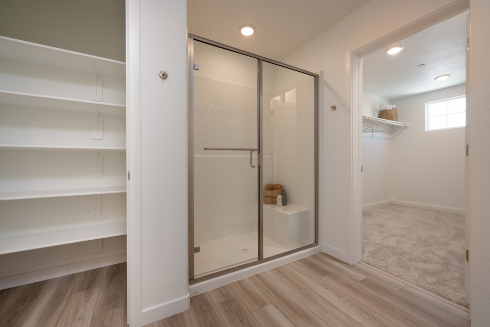 A bathroom with a glass shower.