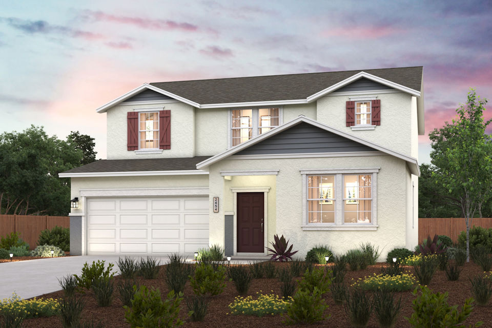 A house with a large front yard.