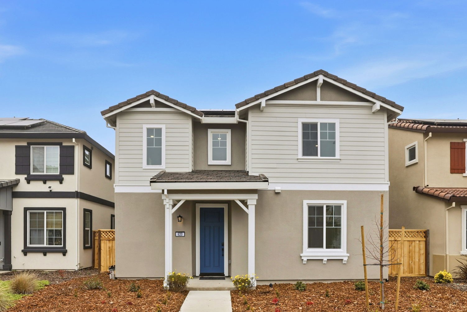A house with a blue door.