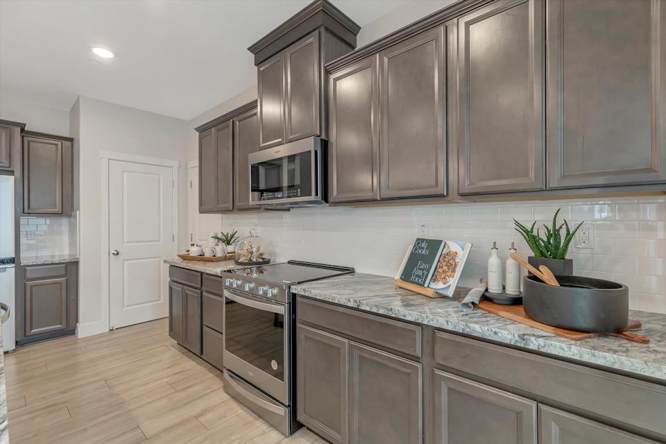 A kitchen with stainless steel appliances.