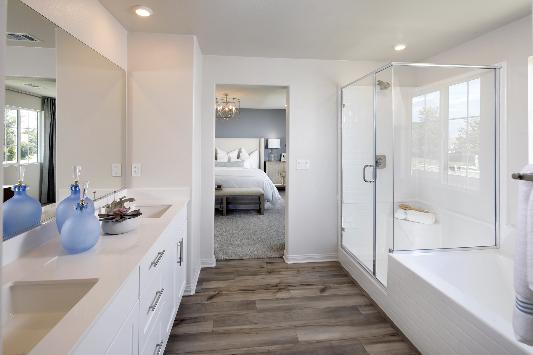 A bathroom with a tub and sink.