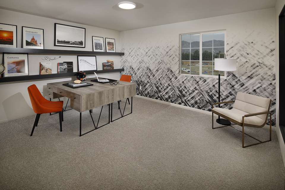 A room with a table and chairs.