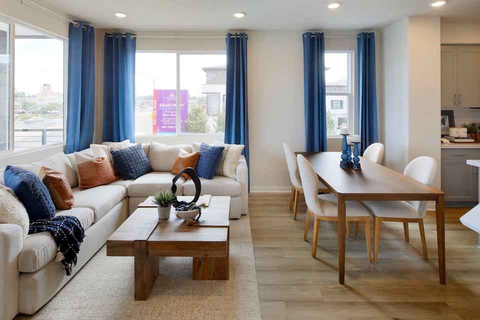 A living room with a couch and a coffee table.