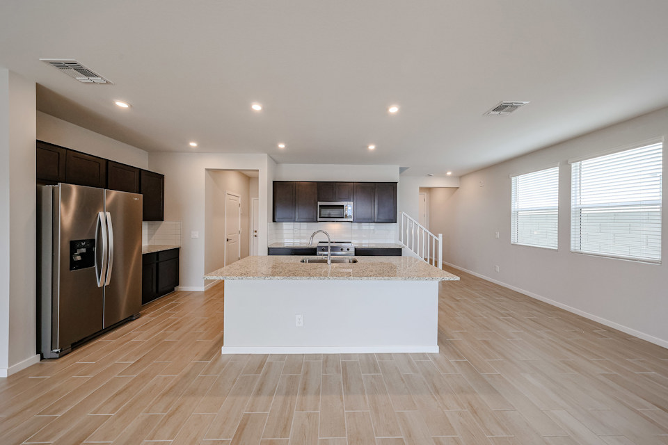 A kitchen with a large island.