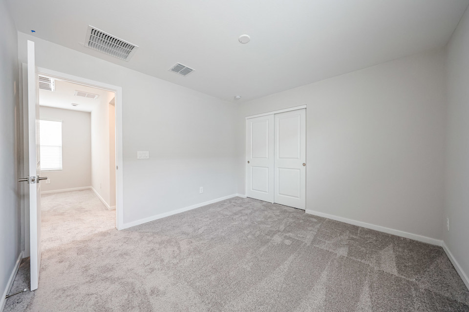 A room with white doors.