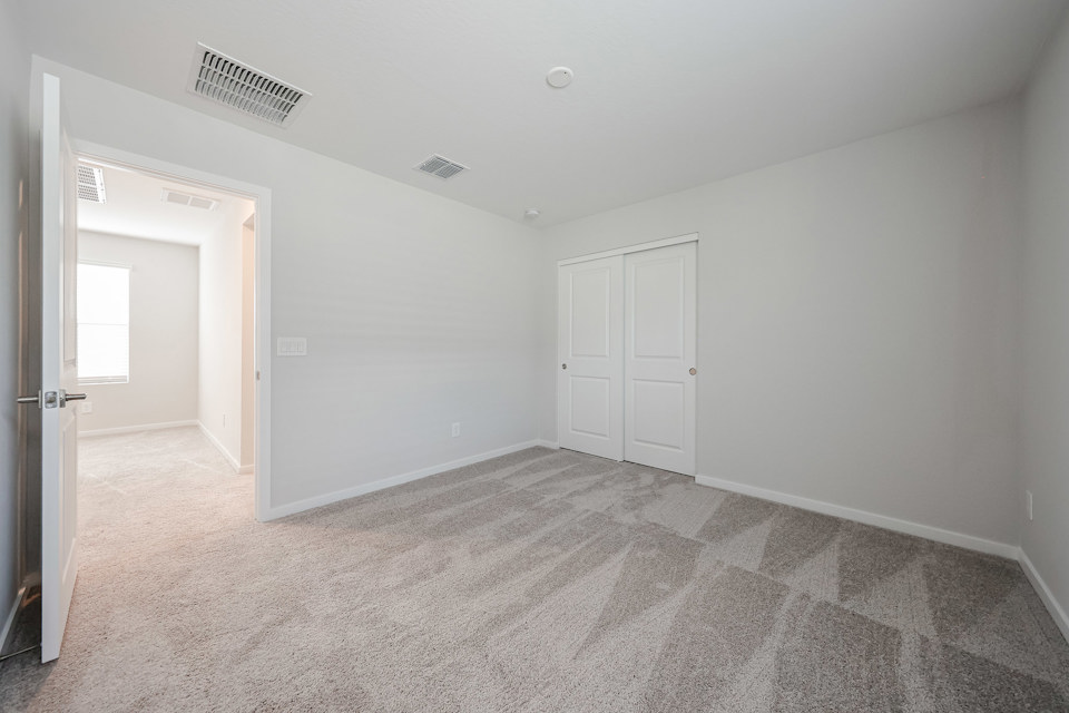 A room with white doors.