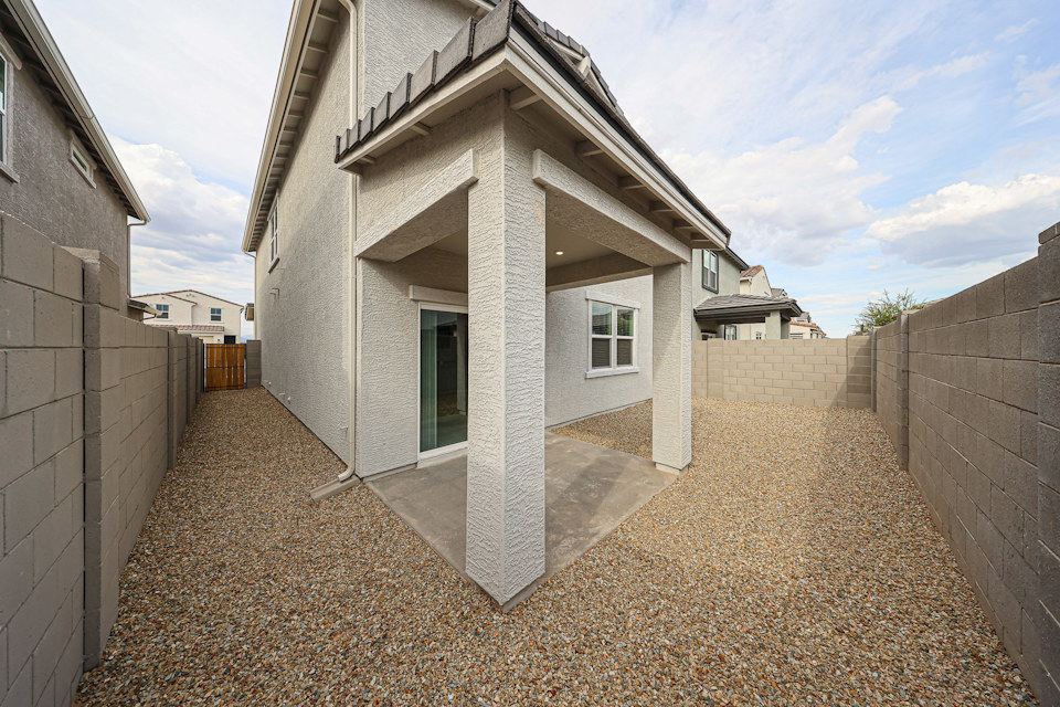 A building with a stone walkway.