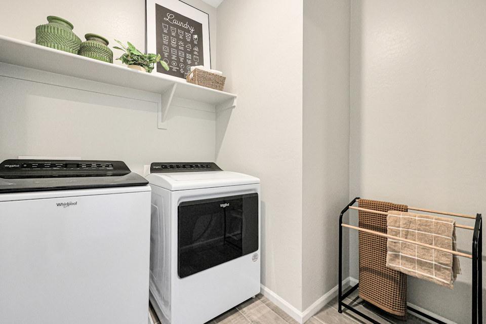 A kitchen with white appliances.