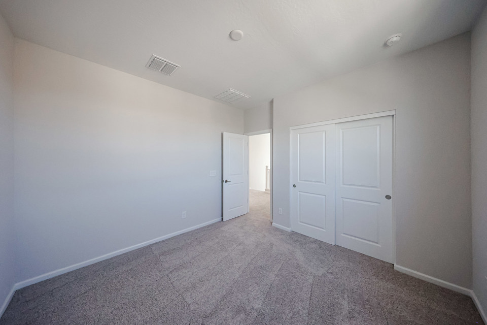 A room with white doors.