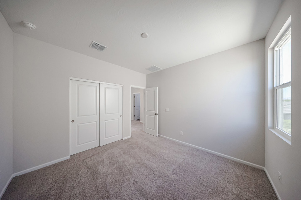 A room with white doors.