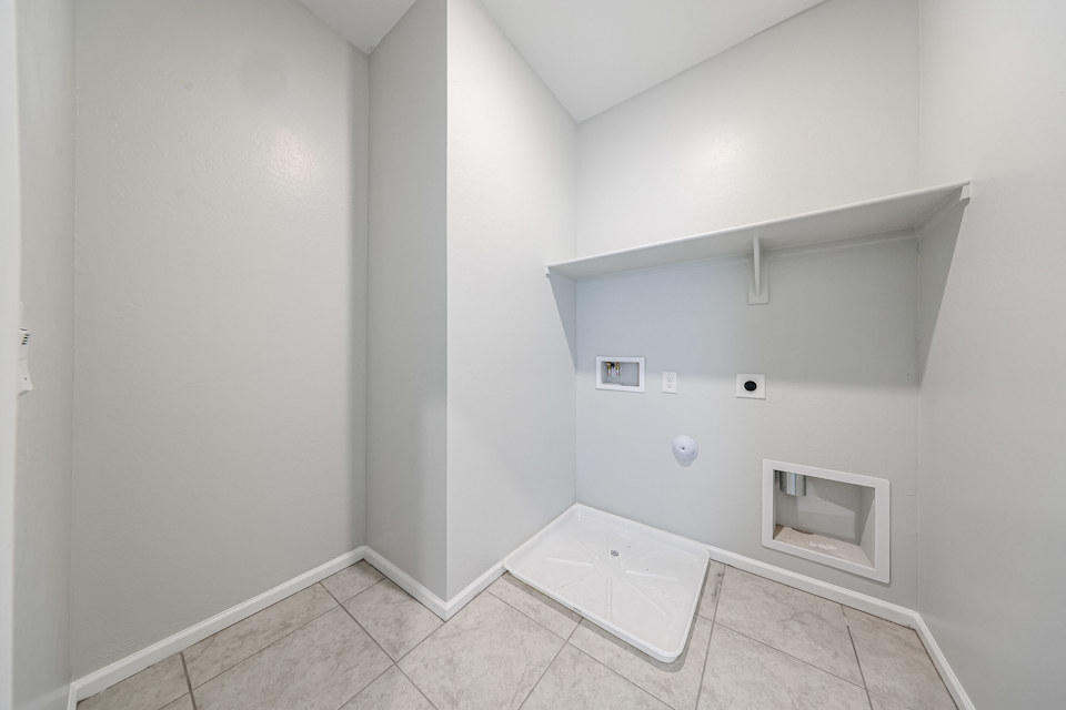 A white tiled room.