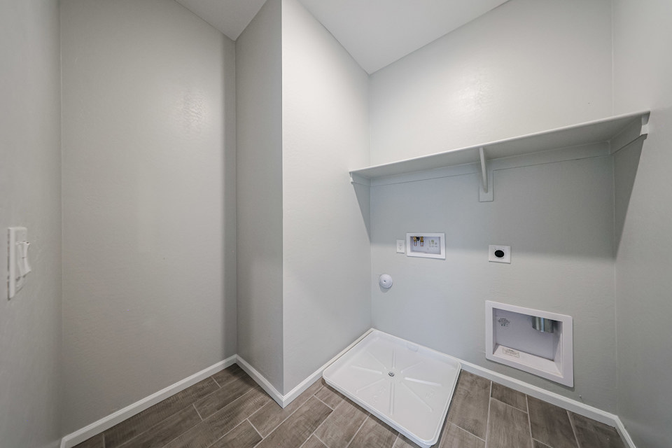 A white tiled room.