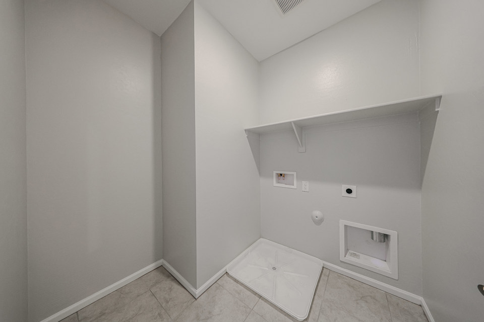 A white tiled room.