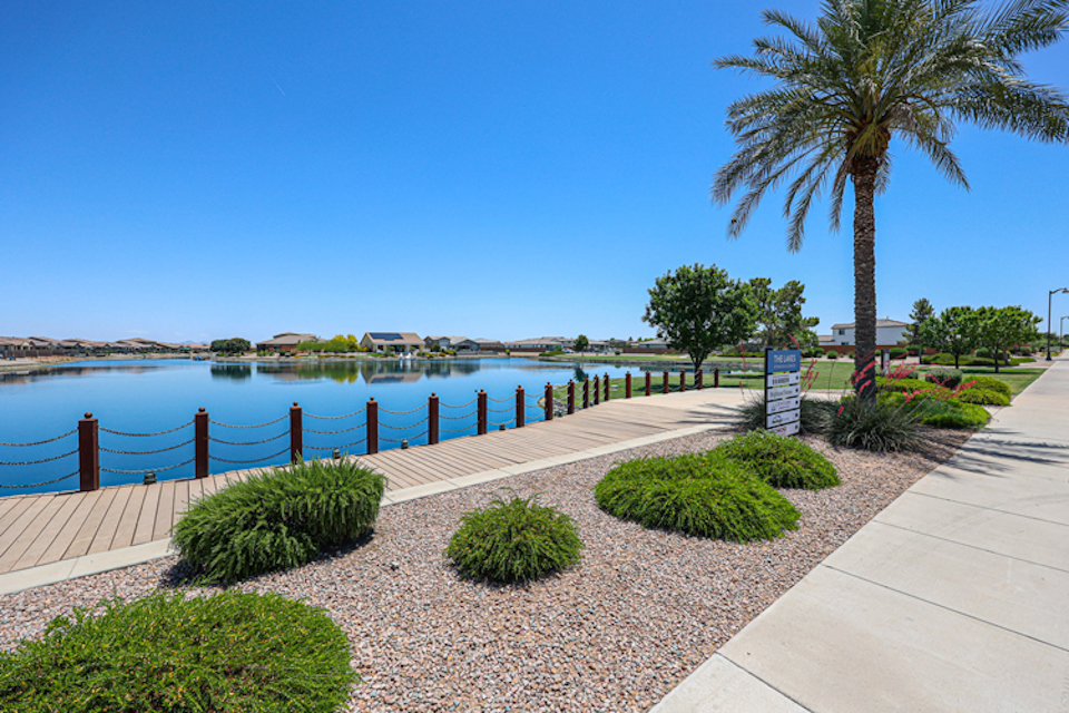 A path next to a body of water.