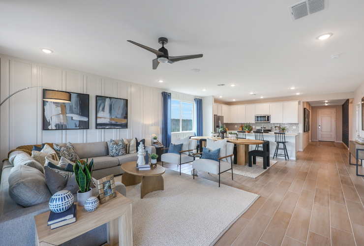 A living room with a wood floor.