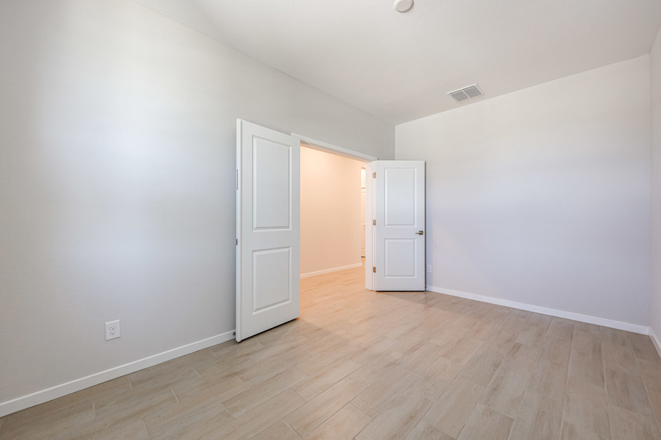 A room with white doors.
