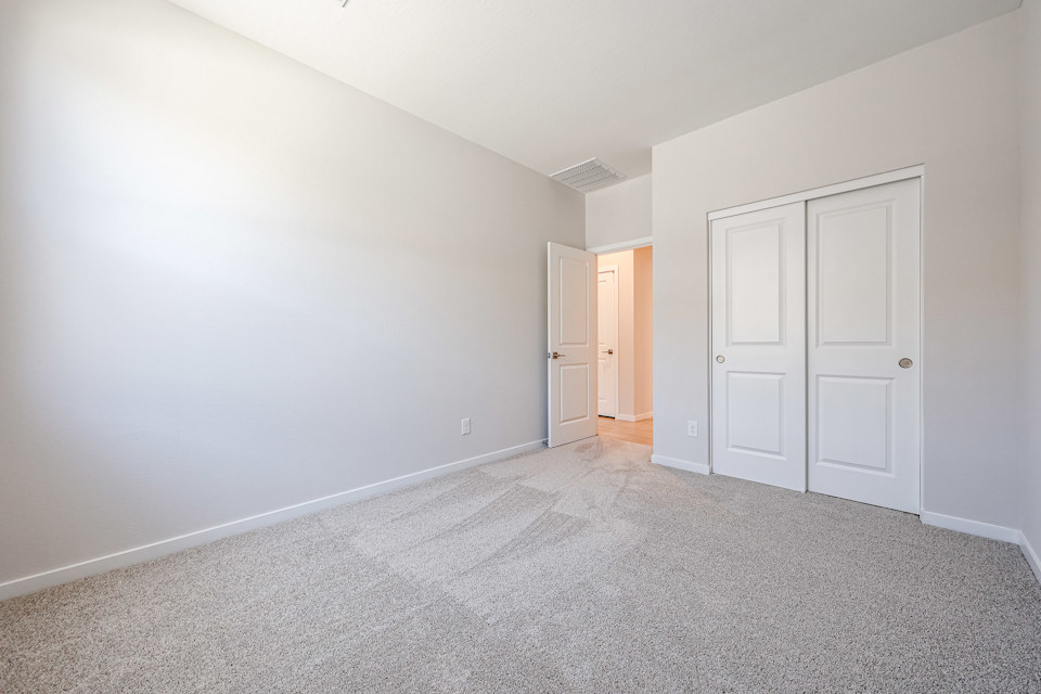 A room with white doors.