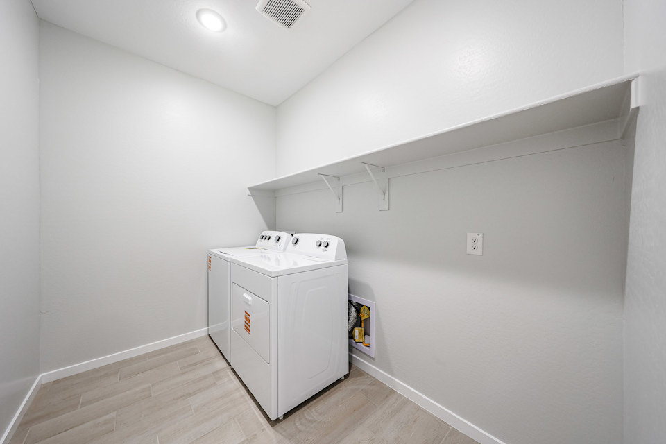 A white laundry room.