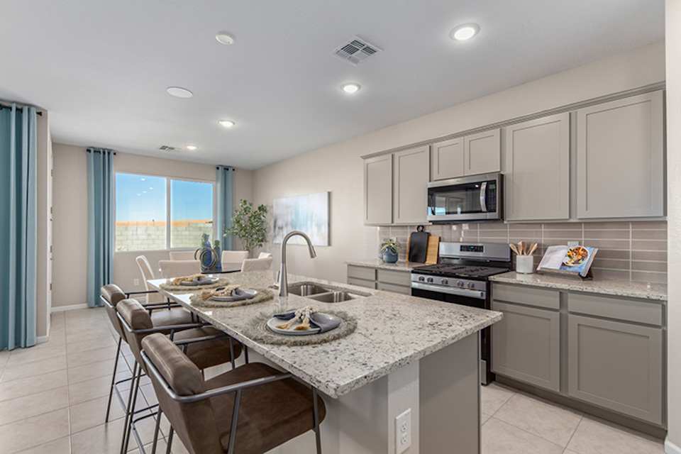 A kitchen with a large island.