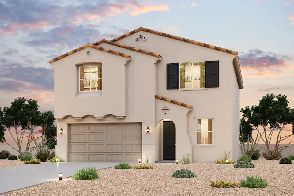 A white house with a garage.