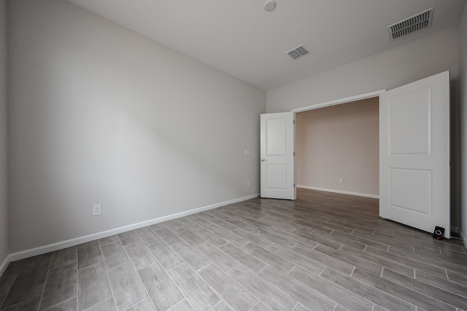 A room with white doors.
