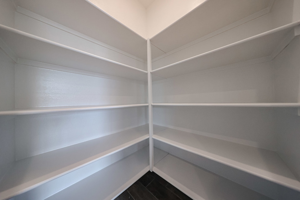 A white shelf with white shelves.