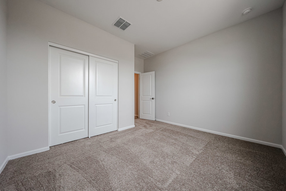 A room with white doors.