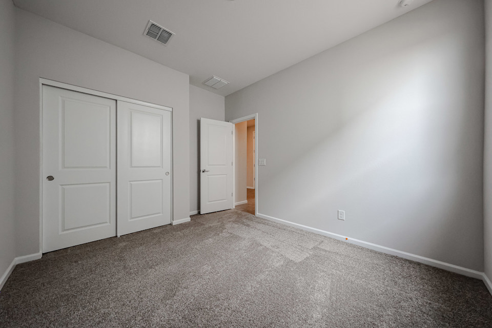 A room with white doors.