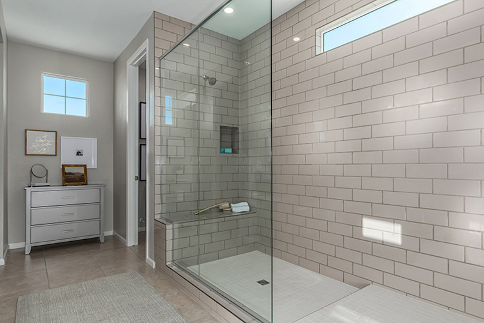 A bathroom with a glass shower.