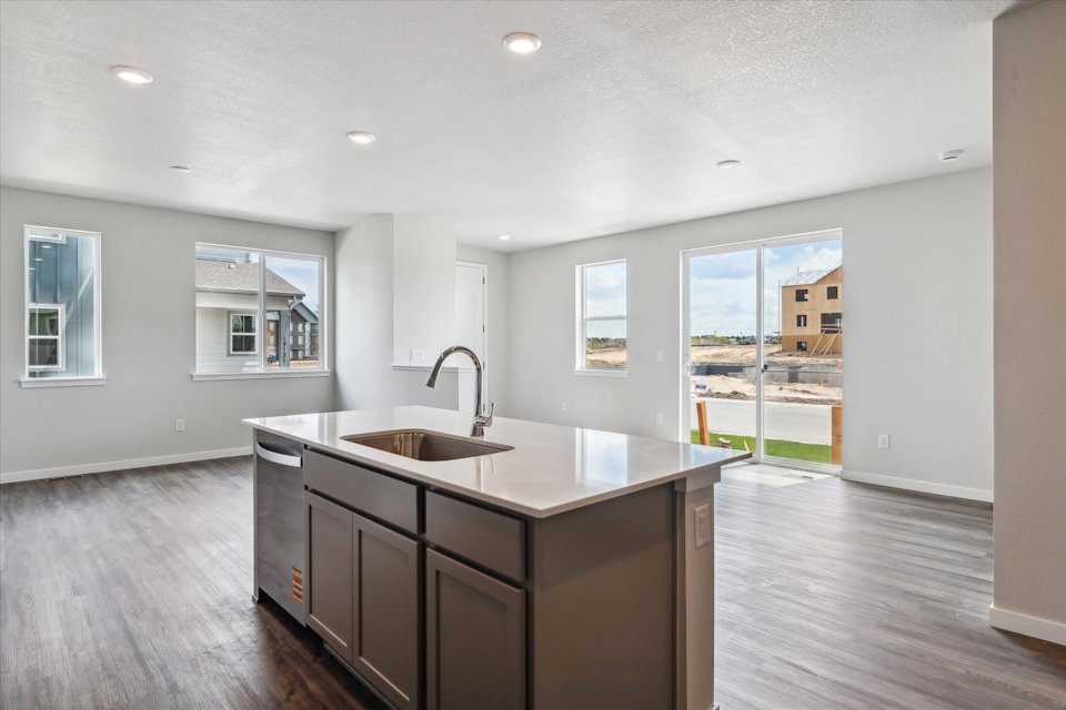 A kitchen with a large island.