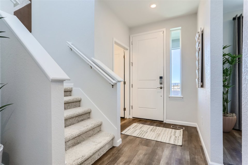 A white staircase in a house.