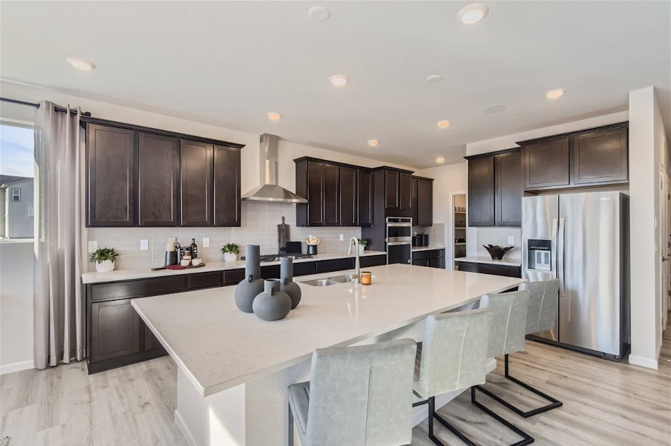 A kitchen with a large island.