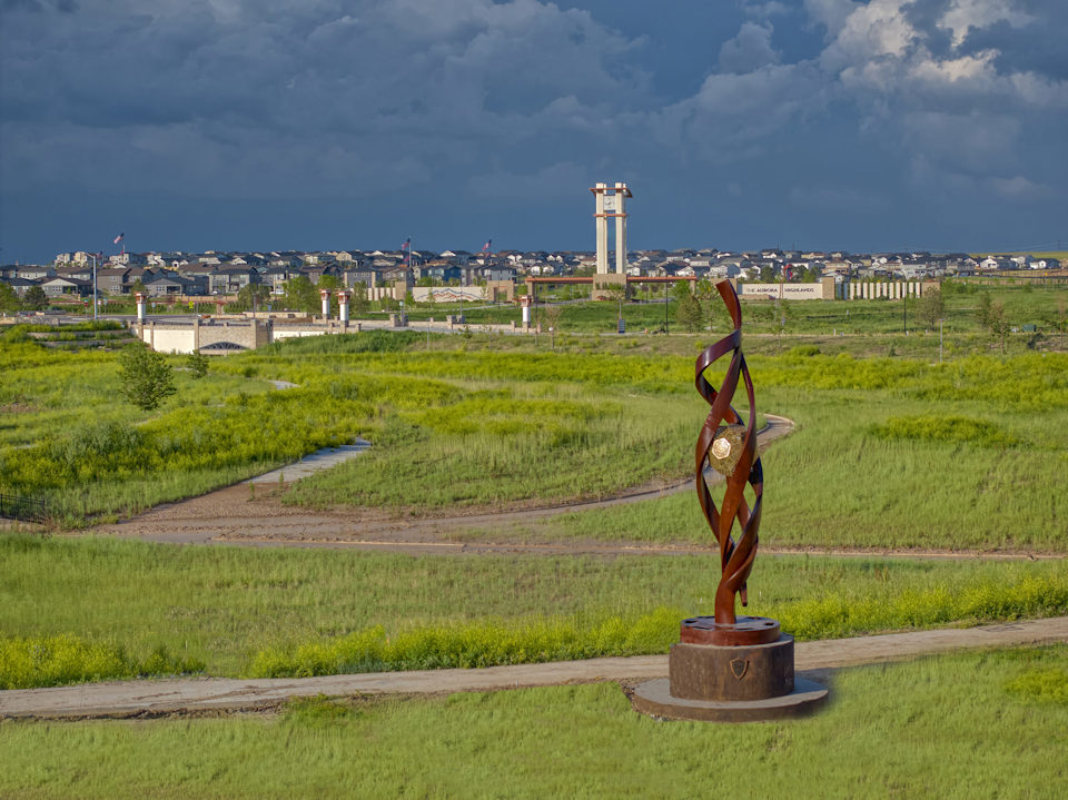A statue in a field.