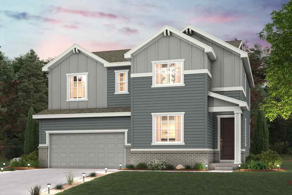 A grey house with a garage.