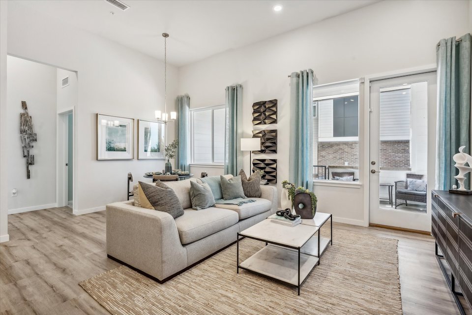 A living room with a couch and a coffee table.