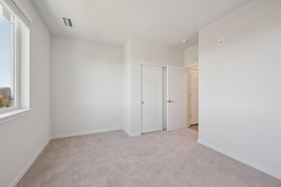 A room with white doors.