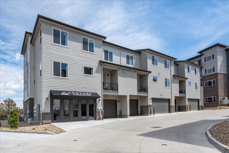 A building with a parking lot.