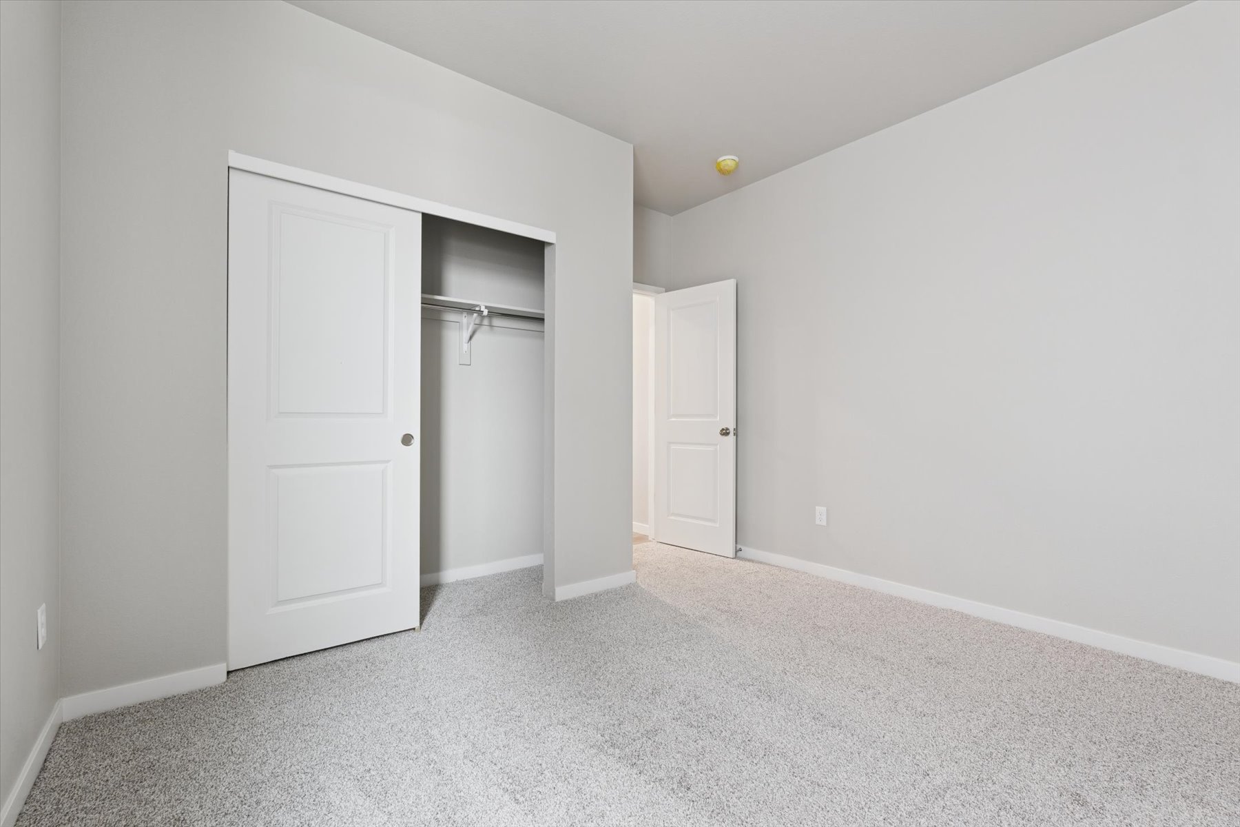 A room with white doors.