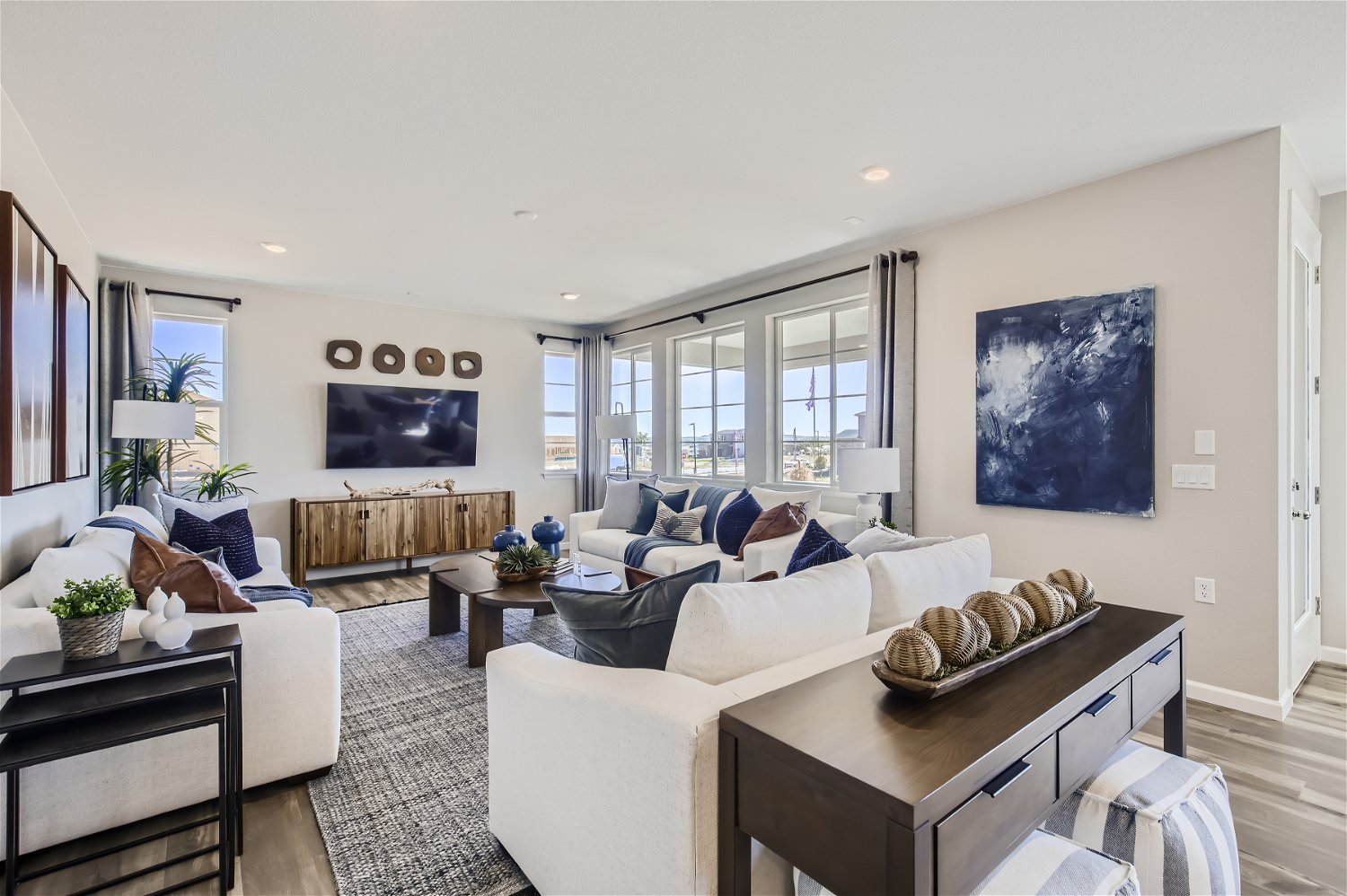 A living room with a large window.