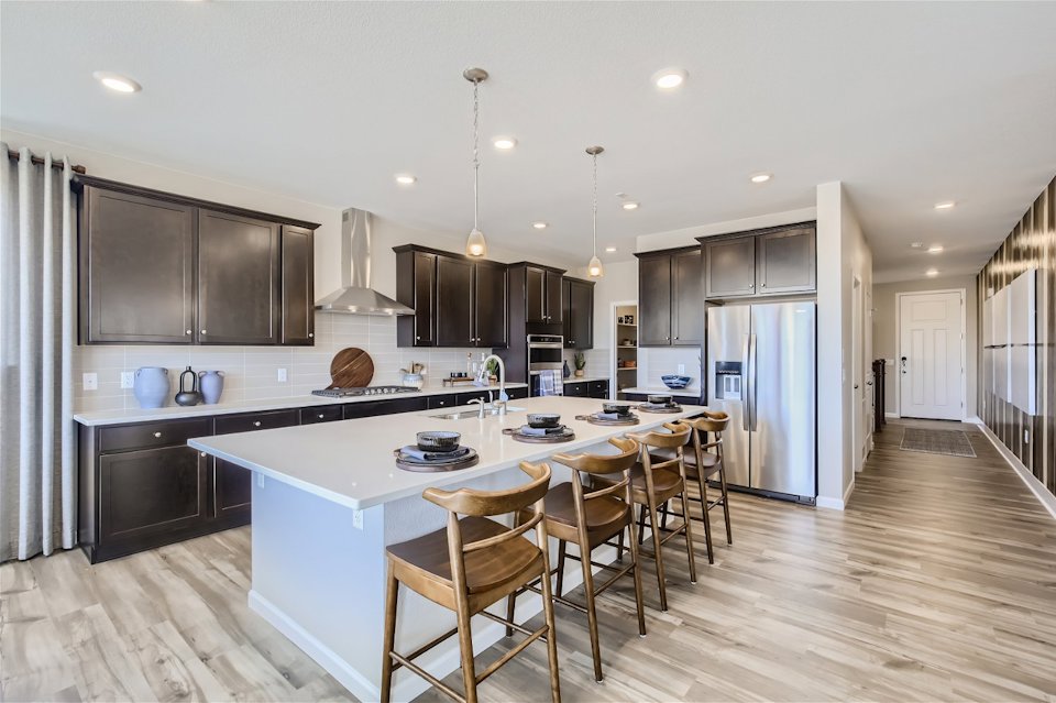 A kitchen with a large island.