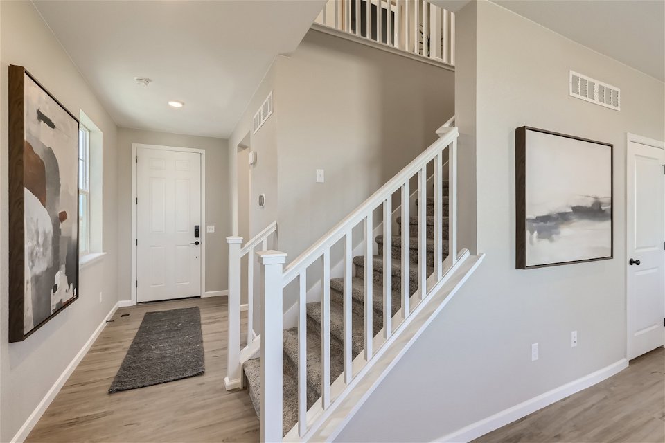 A white staircase in a house.