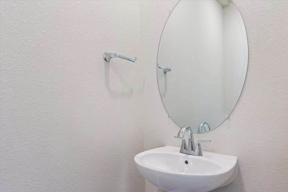 A mirror on a wall.