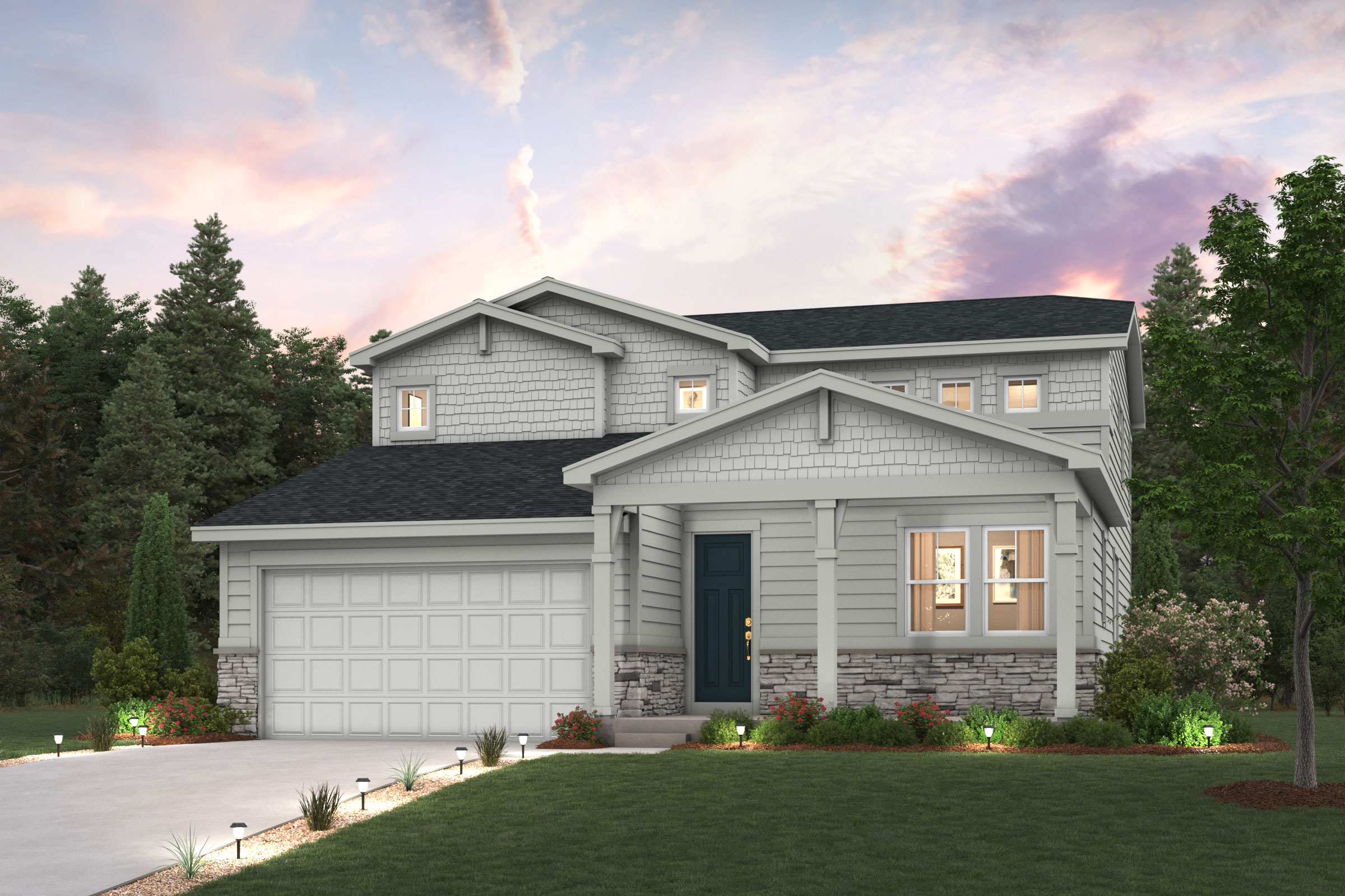 A house with a garage and trees in the back.