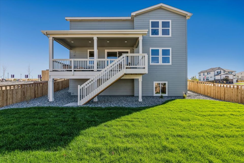 A house with a large front yard.