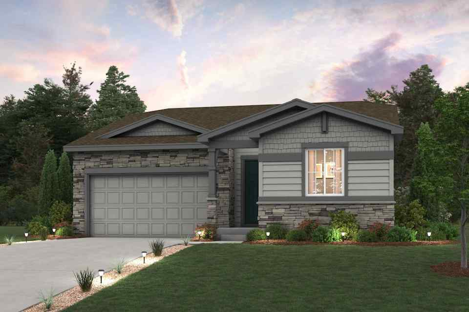 A house with a garage and trees in the back.